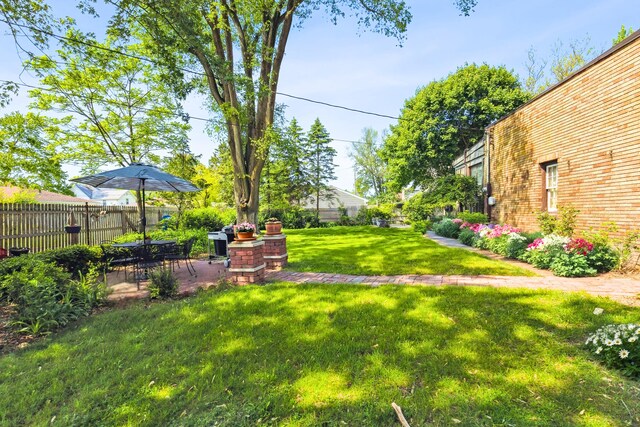 616 S Elm St, Three Oaks, MI 49128 - view of yard with a patio