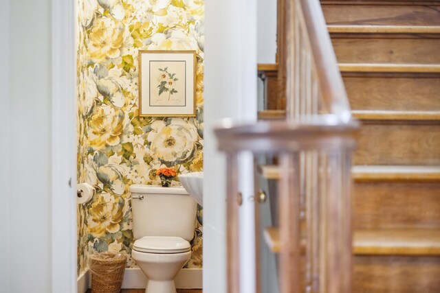 616 S Elm St, Three Oaks, MI 49128 - half bathroom with toilet and wallpapered walls
