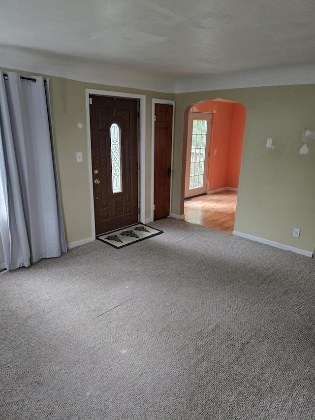 15495 Chelsea, Redford, MI 48239 - carpeted foyer entrance featuring arched walkways and baseboards