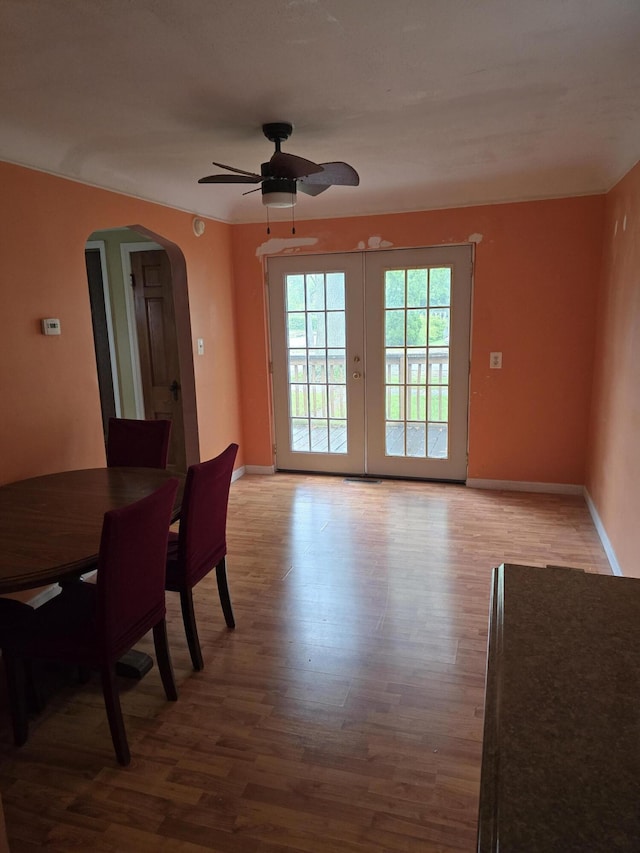 15495 Chelsea, Redford, MI 48239 - dining area featuring arched walkways, a ceiling fan, wood finished floors, and baseboards