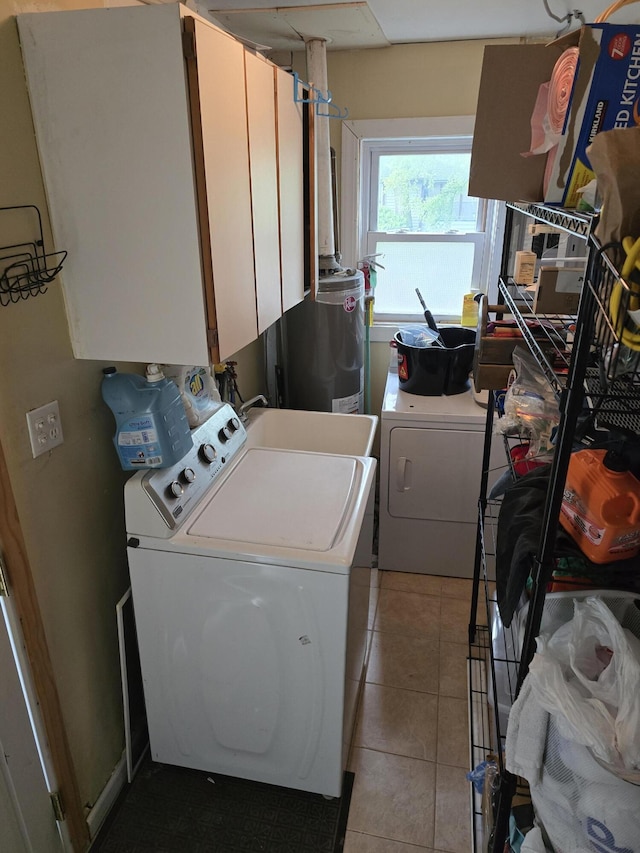 15495 Chelsea, Redford, MI 48239 - washroom featuring independent washer and dryer, cabinet space, and light tile patterned floors