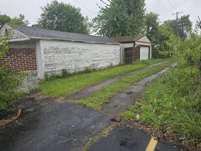 15495 Chelsea, Redford, MI 48239 - view of yard featuring a detached garage and an outbuilding