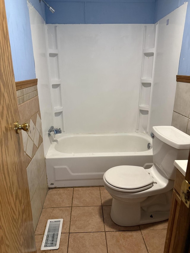 501 N US-131 Hwy # 17, White Pigeon, MI 49099 - full bathroom featuring tile patterned flooring, toilet, shower / bathtub combination, and vanity