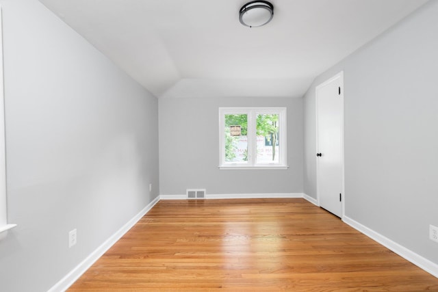 2316 Brockman Blvd, Ann Arbor, MI 48104 - bonus room featuring lofted ceiling, light wood-type flooring, and baseboards