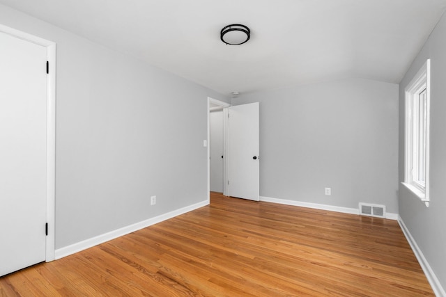 2316 Brockman Blvd, Ann Arbor, MI 48104 - spare room with light wood-style floors, lofted ceiling, and baseboards