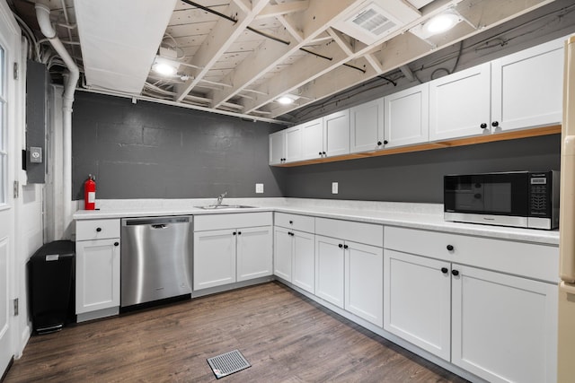 2316 Brockman Blvd, Ann Arbor, MI 48104 - kitchen with appliances with stainless steel finishes, light countertops, white cabinetry, and a sink