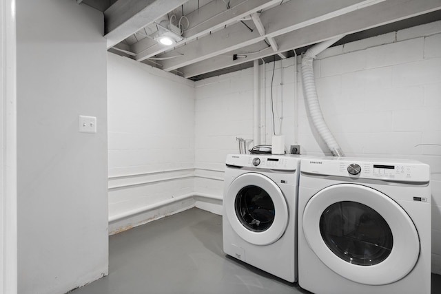 2316 Brockman Blvd, Ann Arbor, MI 48104 - washroom with washing machine and clothes dryer and concrete block wall
