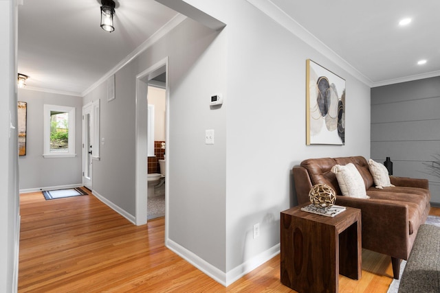 2316 Brockman Blvd, Ann Arbor, MI 48104 - living area featuring ornamental molding, light wood-style flooring, baseboards, and recessed lighting