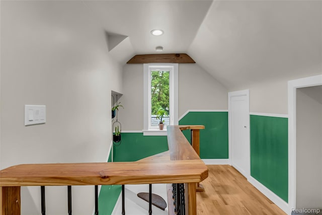 1104 James K Blvd, Pontiac, MI 48341 - office area with wood finished floors, baseboards, and lofted ceiling