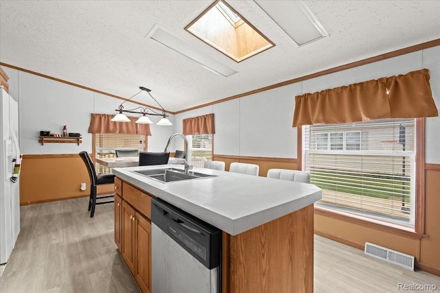 4813 Othello Ln, Northville, MI 48167 - kitchen with a sink, stainless steel dishwasher, ornamental molding, a textured ceiling, and light wood finished floors