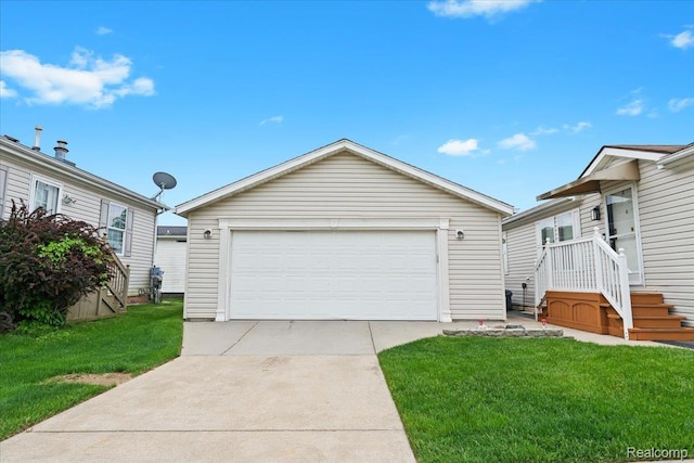 4813 Othello Ln, Northville, MI 48167 - view of front of house featuring a detached garage, a front yard, and an outdoor structure