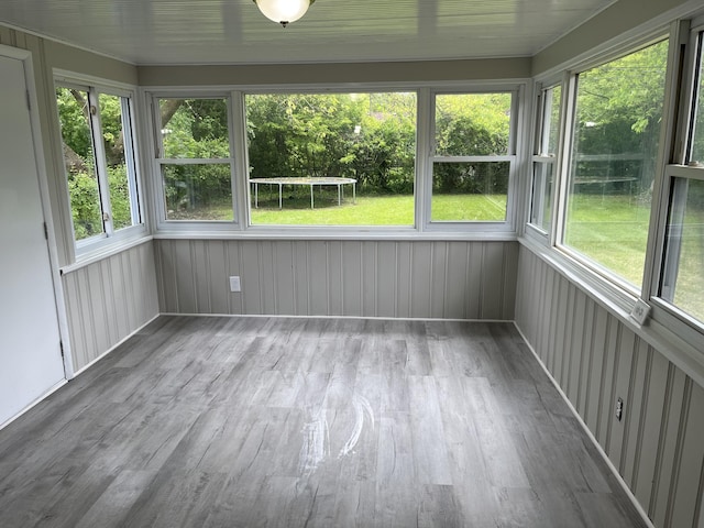 24680 Kenosha St, Oak Park, MI 48237 - unfurnished sunroom with wood finished floors and plenty of natural light