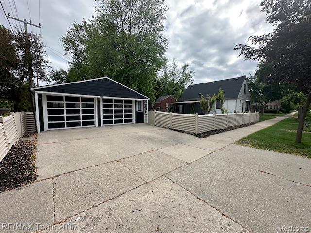 1042 Drexel St, Dearborn, MI 48128 - view of side of property featuring a garage and an outdoor structure