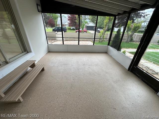 1042 Drexel St, Dearborn, MI 48128 - unfurnished sunroom featuring radiator heating unit