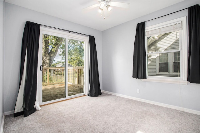 515 Fairfield Ave, Battle Creek, MI 49015 - carpeted empty room featuring baseboards and a ceiling fan