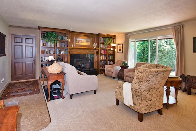 2727 S Lakeshore Dr Unit F-24, Saint Joseph, MI 49085 - living room with crown molding, light carpet, and a glass covered fireplace