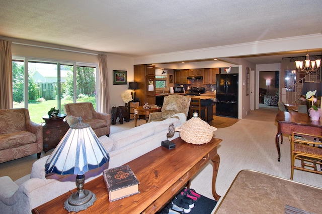 2727 S Lakeshore Dr Unit F-24, Saint Joseph, MI 49085 - living area featuring a chandelier, light colored carpet, and crown molding