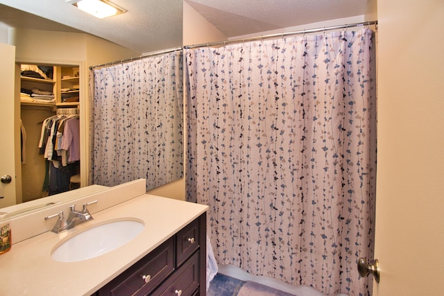 2727 S Lakeshore Dr Unit F-24, Saint Joseph, MI 49085 - bathroom featuring vanity and a shower with shower curtain