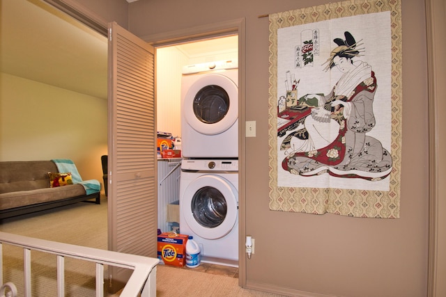 2727 S Lakeshore Dr Unit F-24, Saint Joseph, MI 49085 - washroom with stacked washing machine and dryer and tile patterned flooring