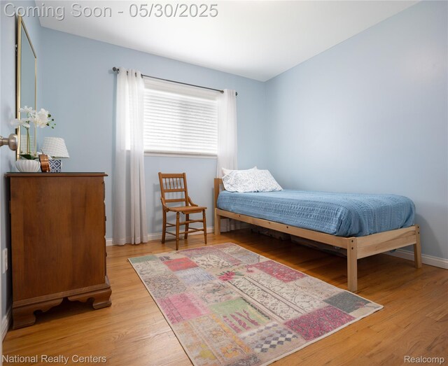 33532 Regal, Fraser, MI 48026 - bedroom featuring wood finished floors and baseboards