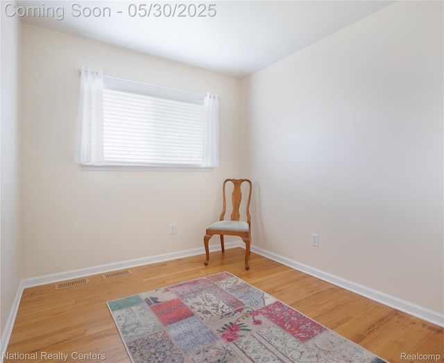 33532 Regal, Fraser, MI 48026 - living area featuring wood finished floors and baseboards