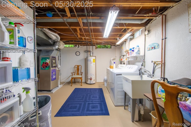 33532 Regal, Fraser, MI 48026 - laundry area with gas water heater, washing machine and clothes dryer, and heating unit