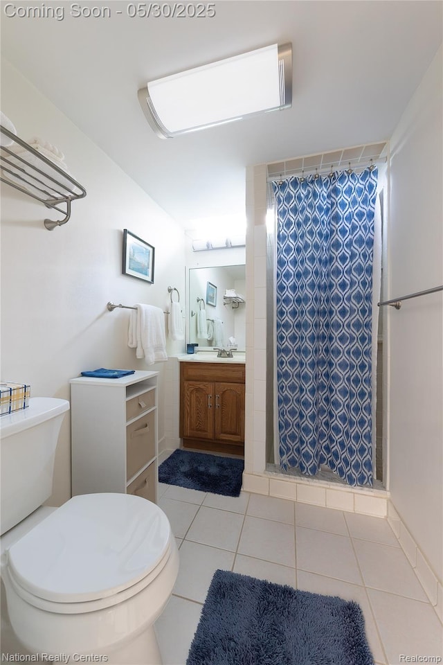 33532 Regal, Fraser, MI 48026 - full bathroom featuring toilet, vanity, a stall shower, and tile patterned floors