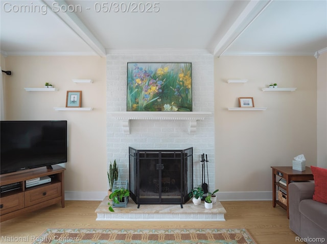 33532 Regal, Fraser, MI 48026 - living room with wood finished floors, beamed ceiling, baseboards, ornamental molding, and a brick fireplace