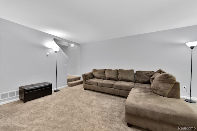 16125 Terrace Village Dr, Taylor, MI 48180 - living room with carpet floors, baseboards, and stairway
