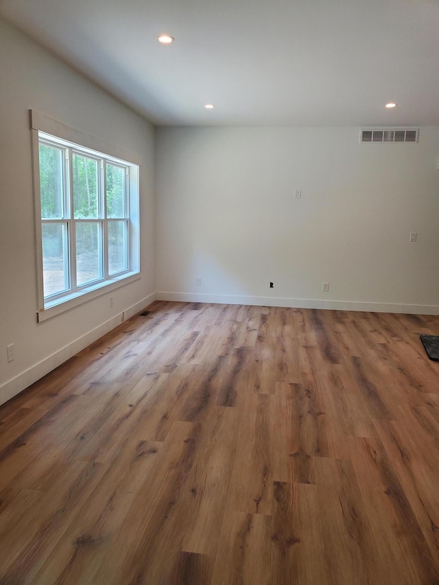 3995 112th Ave, Allegan, MI 49010 - spare room featuring wood finished floors and recessed lighting