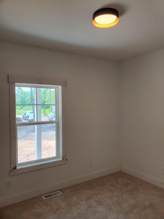 3995 112th Ave, Allegan, MI 49010 - carpeted empty room with baseboards
