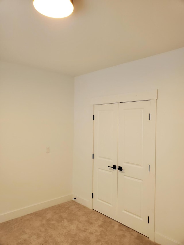3995 112th Ave, Allegan, MI 49010 - unfurnished bedroom with light colored carpet and a closet