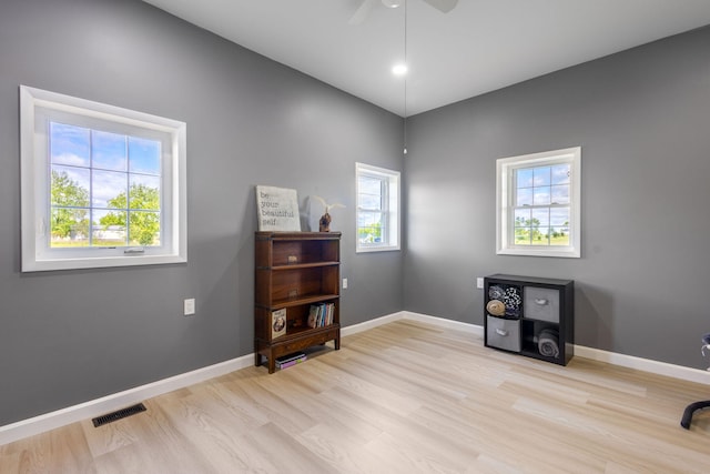 17495 Bison Trl, White Pigeon, MI 49099 - home office with light wood-type flooring, a ceiling fan, baseboards, and vaulted ceiling