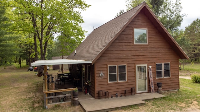 6210 W Monroe Rd, Hesperia, MI 49421 - back of property featuring a lawn