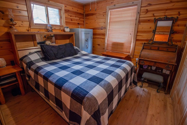 6210 W Monroe Rd, Hesperia, MI 49421 - bedroom featuring wood finished floors and wooden walls