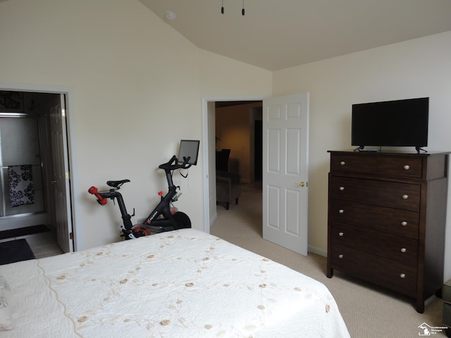 36111 Traditions Dr, Westland, MI 48185 - bedroom with lofted ceiling, light colored carpet, and connected bathroom