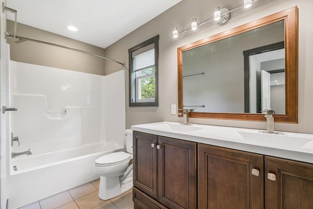 124 S Shore Dr, Portage, MI 49002 - full bath with double vanity, toilet, tile patterned flooring, and shower / bathtub combination