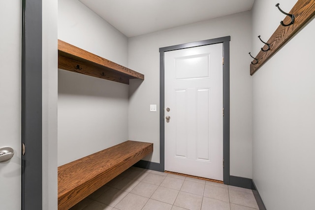 124 S Shore Dr, Portage, MI 49002 - mudroom with light tile patterned floors and baseboards