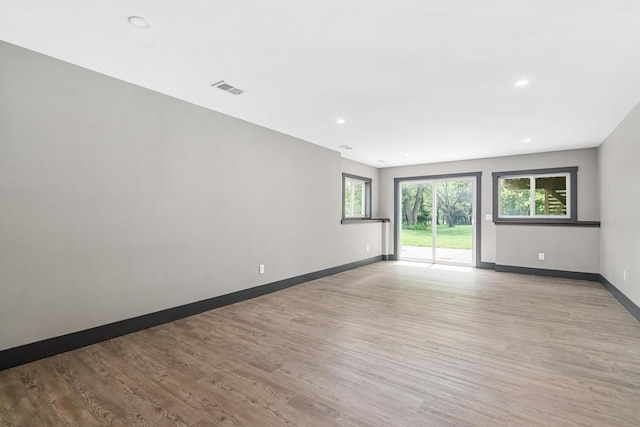 124 S Shore Dr, Portage, MI 49002 - spare room with light wood-style floors, baseboards, and recessed lighting