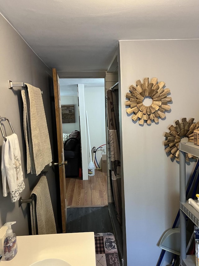 8953 18th Ave, Bitely, MI 49309 - full bath with wood finished floors and curtained shower