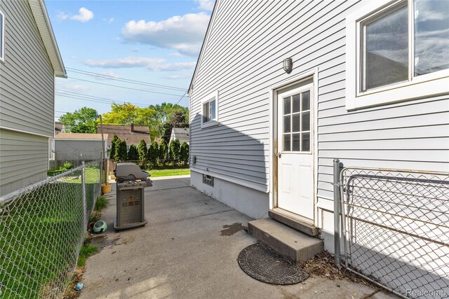 125 Tecumseh St, Clawson, MI 48017 - view of patio / terrace featuring grilling area and entry steps