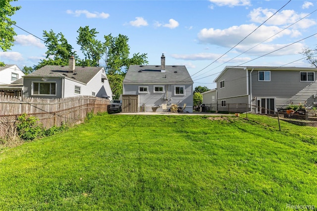 125 Tecumseh St, Clawson, MI 48017 - back of house with a patio area