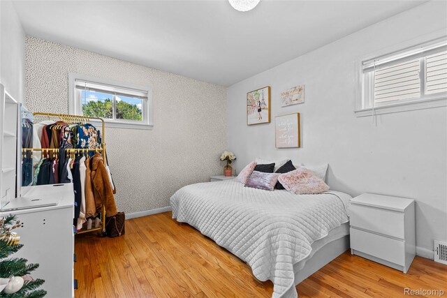125 Tecumseh St, Clawson, MI 48017 - bedroom with wood finished floors and baseboards