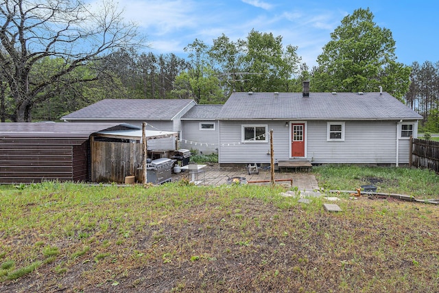 7694 Norconk Rd, Bear Lake, MI 49614 - back of house with a patio