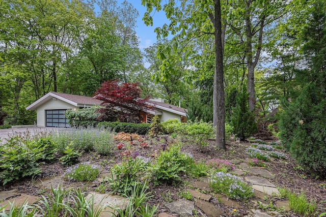 202 Orchard Hills Dr, Ann Arbor, MI 48104 - view of front facade with an attached garage and driveway
