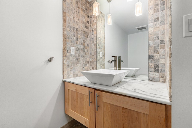 202 Orchard Hills Dr, Ann Arbor, MI 48104 - bathroom with vanity and wood finished floors