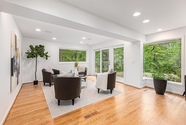 202 Orchard Hills Dr, Ann Arbor, MI 48104 - living room featuring plenty of natural light, light wood-style floors, recessed lighting, and baseboards