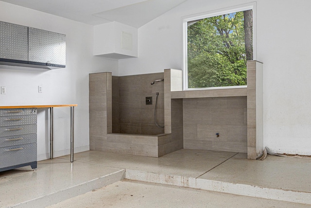 202 Orchard Hills Dr, Ann Arbor, MI 48104 - bathroom with a tile shower and speckled floor