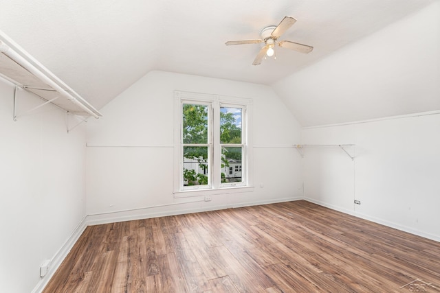 1508 Mckinley St, Bay City, MI 48708 - additional living space with lofted ceiling, ceiling fan, wood finished floors, and baseboards