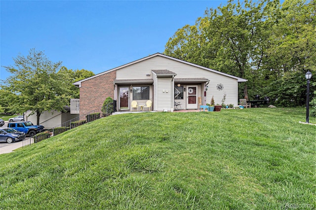 313 Spring Brooke Dr, Brighton, MI 48116 - view of front of house featuring a front lawn